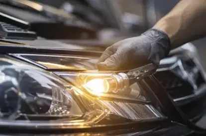 Bulb replacement or headlight restoration service